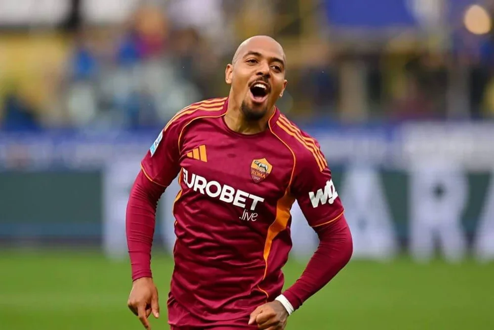 Donyell Malen celebrates scoring the first of his two goals in Roma's 3-2 win at Parma